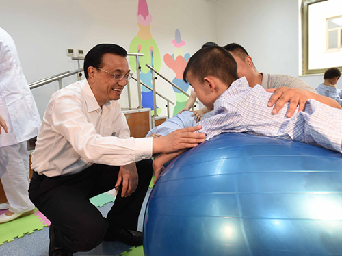 這三年，總理牽掛的殘疾人群體，迎來(lái)哪些暖政？