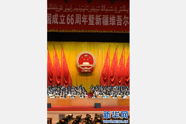 10月1日，慶祝中華人民共和國(guó)成立66周年暨新疆維吾爾自治區(qū)成立60周年大會(huì)在新疆人民會(huì)堂隆重舉行。 新華社記者 高潔 攝 