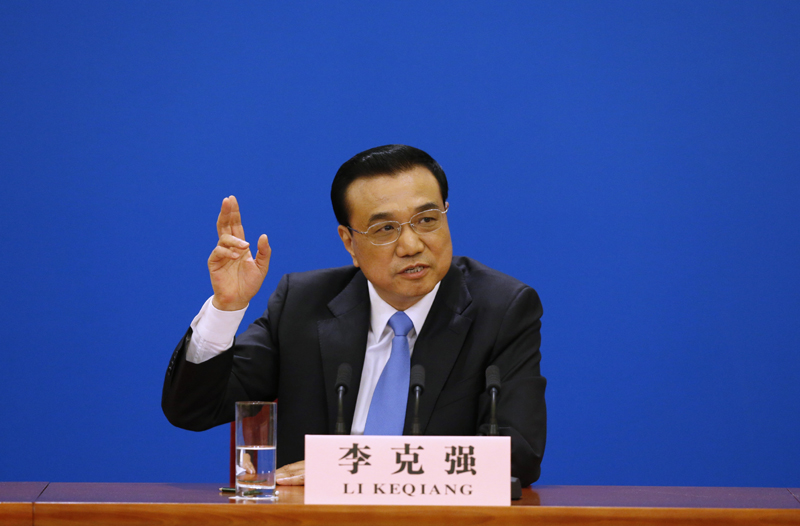3月15日，國務(wù)院總理李克強(qiáng)在北京人民大會(huì)堂與中外記者見面，并回答記者提問。 新華社記者 沈伯韓 攝