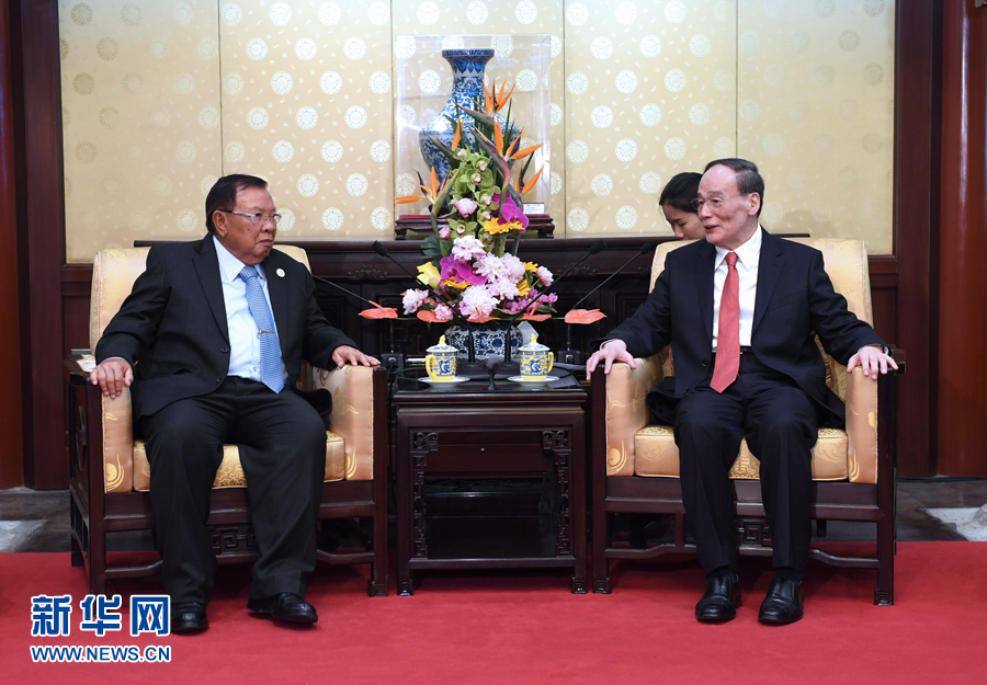 5月13日，中共中央政治局常委、中央紀(jì)委書記王岐山在北京釣魚臺國賓館會見老撾人民革命黨中央總書記、國家主席本揚。 新華社記者 饒愛民攝