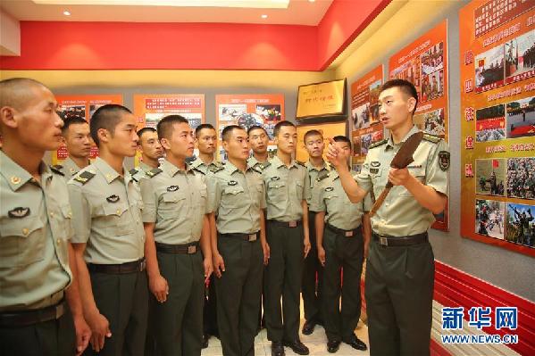 (十九大代表風(fēng)采·圖文互動(dòng))(1)“大功三連”指導(dǎo)員王金龍:矢志強(qiáng)軍的“播火者”