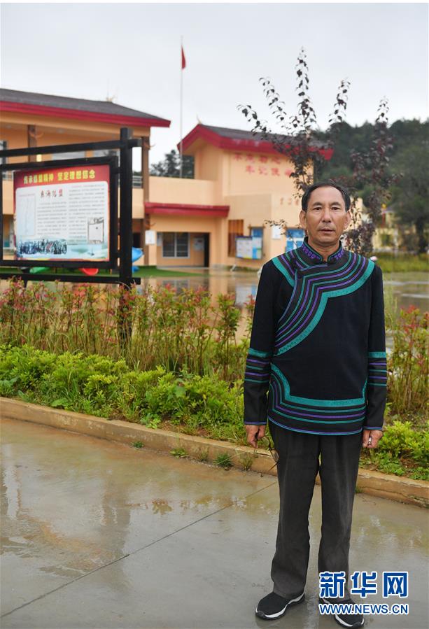 (決戰(zhàn)決勝脫貧攻堅·圖文互動)(3)“共產(chǎn)黨人一直在堅守初心”——一位彝族畢摩后人的感慨