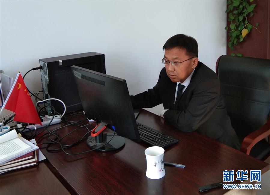 (愛國情 奮斗者·圖文互動(dòng))(1)“我對工作有一種情結(jié)”——記25年堅(jiān)守一線的鶴崗基層法官孫波