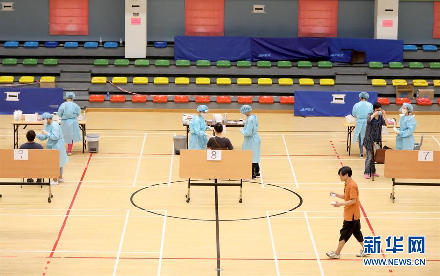 （圖文互動）（4）&ldquo;身為醫(yī)護人員一分子，應該出來幫忙&rdquo;&mdash;&mdash;參與新冠病毒社區(qū)檢測的香港醫(yī)護人員速寫