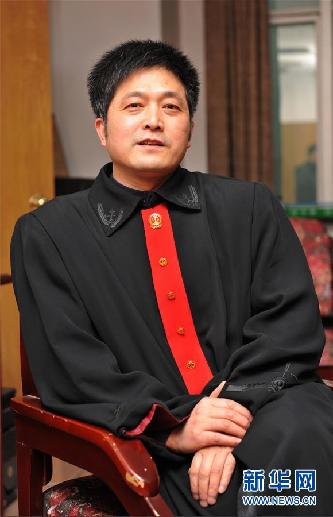 （圖文互動）其人如蘭，既潔且馨&mdash;&mdash;追記&ldquo;全國模范法官&rdquo;胡國運