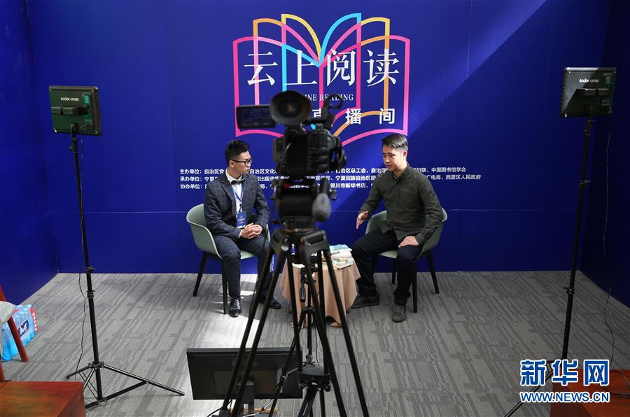 (新華全媒頭條·圖文互動(dòng))(14)我們都是讀者——促進(jìn)全民閱讀 構(gòu)建書香社會(huì)