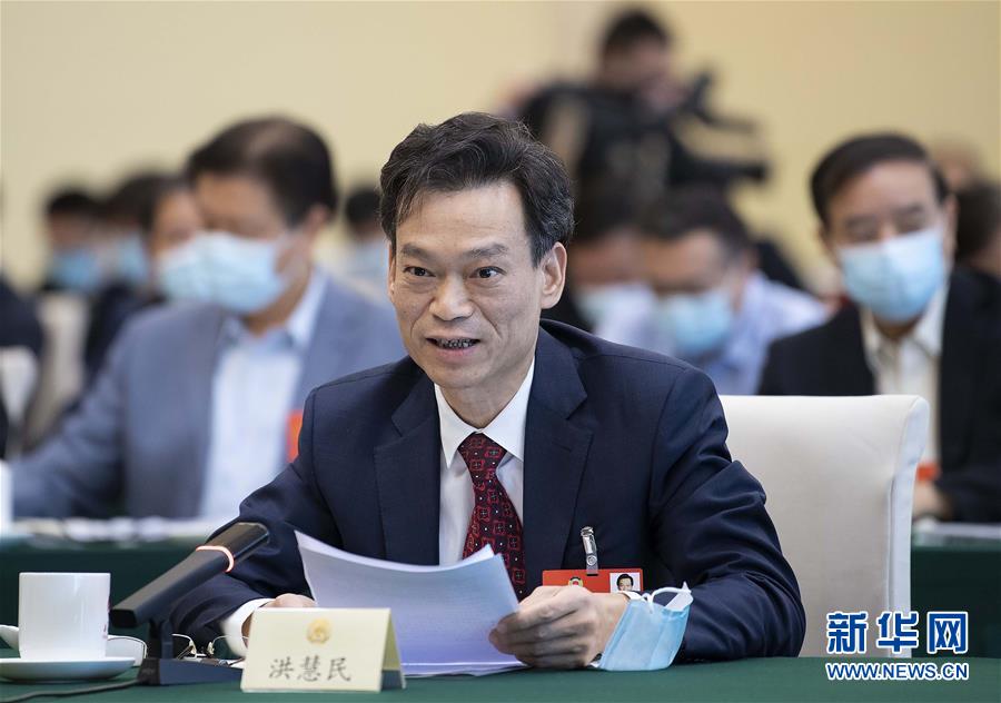 （兩會&middot;熱點畫報）（2）代表委員建言統(tǒng)籌做好經(jīng)濟社會發(fā)展工作