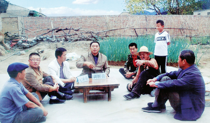 調(diào)解&ldquo;家長里短，雞毛蒜皮&rdquo;的小事情是李培斌從事的大事業(yè)