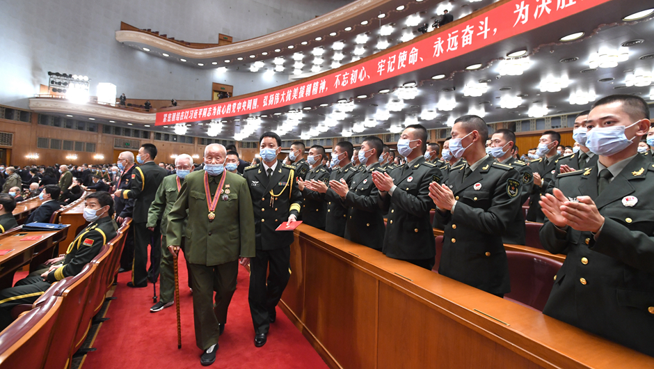 大會(huì)前，志愿軍老同志入場