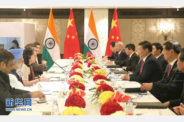 9月19日，國家主席習近平在新德里會見印度國大黨主席索尼婭&middot;甘地和前總理辛格。 新華社記者姚大偉攝