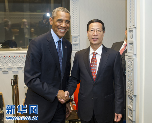 9月23日，國(guó)家主席習(xí)近平特使、國(guó)務(wù)院副總理張高麗在紐約會(huì)見(jiàn)出席聯(lián)合國(guó)氣候峰會(huì)的美國(guó)總統(tǒng)奧巴馬。 新華社記者王曄攝