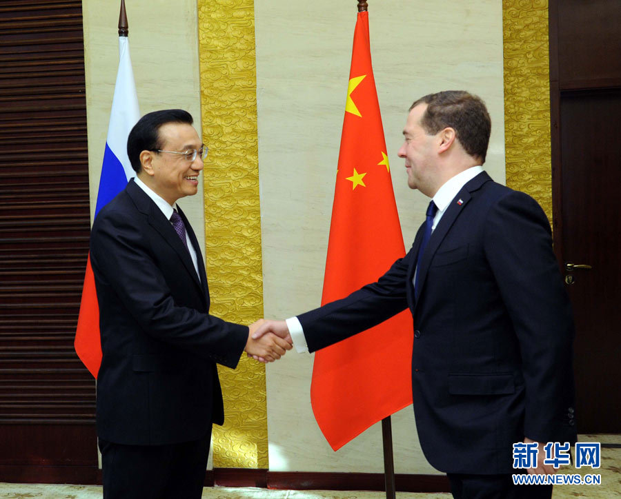 12月15日，中國國務(wù)院總理李克強在阿斯塔納會見俄羅斯總理梅德韋杰夫。 新華社記者 饒愛民 攝