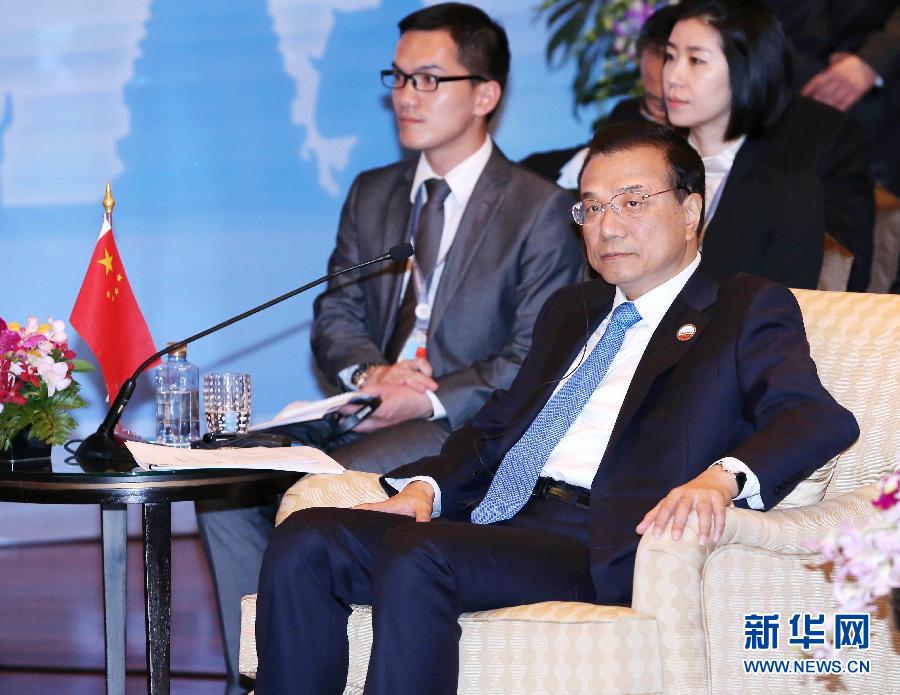 12月20日，中國國務(wù)院總理李克強(qiáng)在曼谷出席大湄公河次區(qū)域經(jīng)濟(jì)合作領(lǐng)導(dǎo)人第五次會(huì)議。 新華社記者 龐興雷 攝 