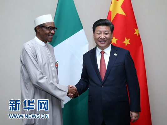 12月4日，國(guó)家主席習(xí)近平在約翰內(nèi)斯堡會(huì)見(jiàn)尼日利亞總統(tǒng)布哈里。 新華社記者 龐興雷 攝 